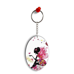 The Pixie With Her Butterflies Oval Key Chain